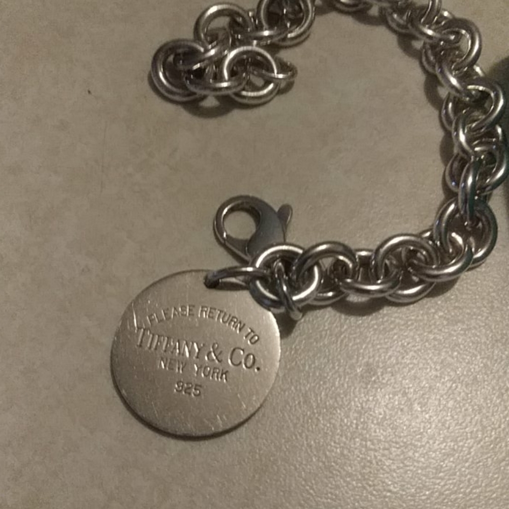 Euc. Auth big tiffany round tag bracelet 7.5